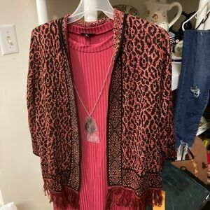 Woman’s dress and sweater